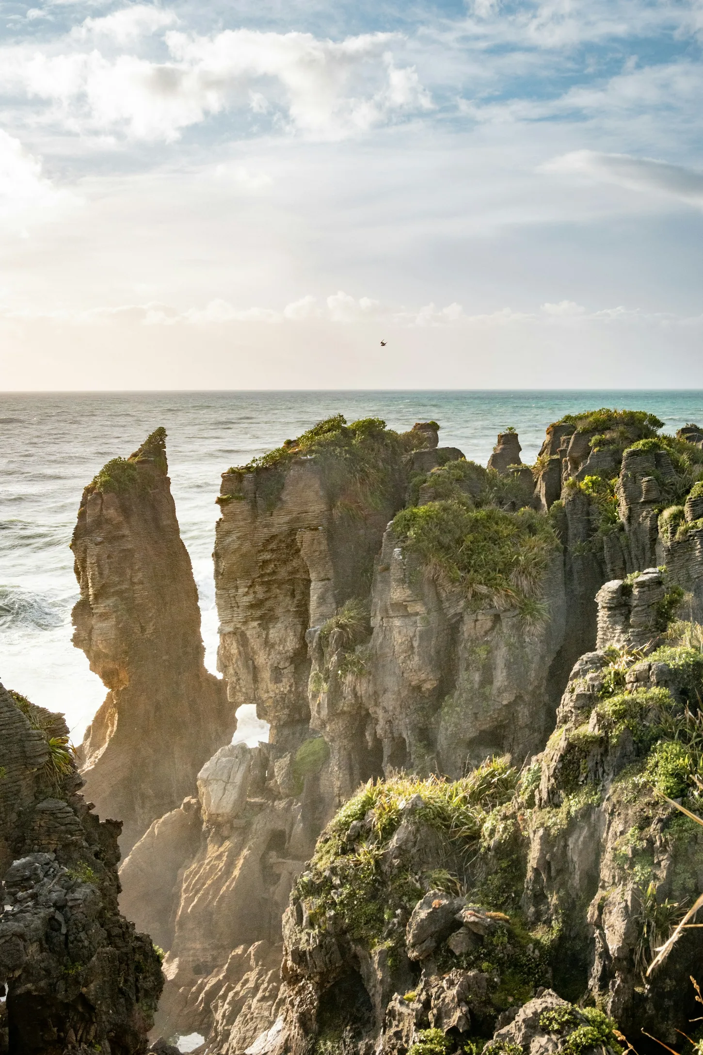 Layered limestone formations at Punakaiki on the wild West Coast